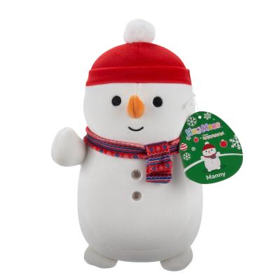 Squishmallows Hugmees 25 cm - Manny a hóember piros sapkában és sállal